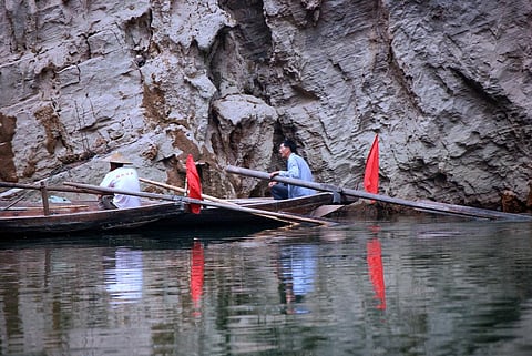 Chinese method of dragging small boat propellers across a reef has caused severe damage to 40 coral reefs Credit: Harvey Barrison / Flicker