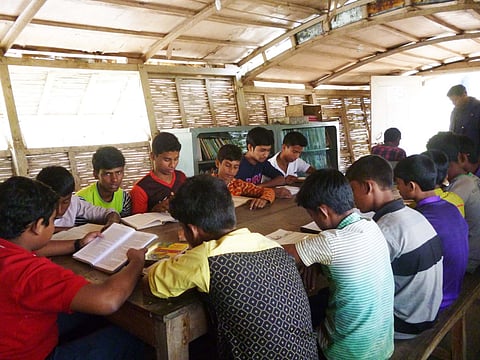 Floating library on the Gumani river. More than 100 such boats bring schools, clinics, libraries and agriculture training centres to people Chalan Beel wetland post monsoon
Photo credit: Archana Yadav