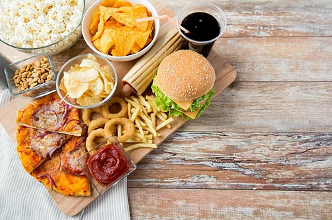 Junk foods almost always use more energy, but land and water use vary between products (Credit: iStock)
