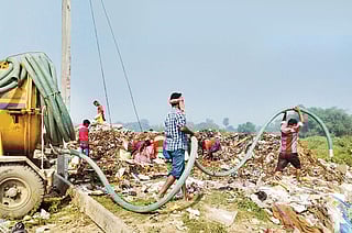 In Bihar's Katihar town most people have toilets with septic tanks. The urban local body collects septage and simply dumps it in the landfill at Udma Rekha (Photo: Anil Yadav)