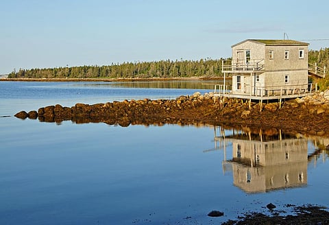 Lennox Island is vulnerable to coastal erosion because it’s made of sand and sandstone and lacks hard bedrock. Credit: Dennis Jarvis/ Flicker