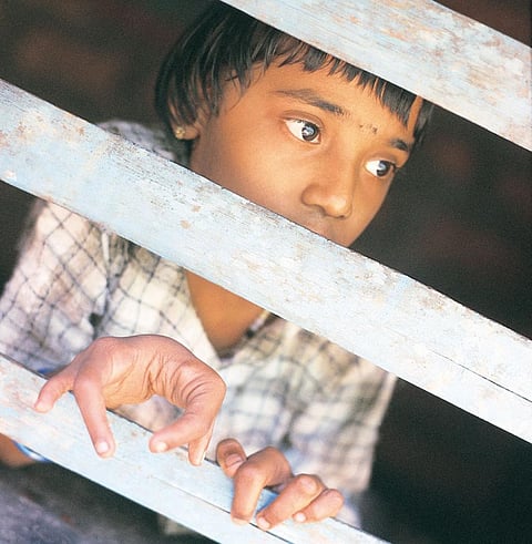 In 2001, when Down To Earth
visited Kasargod, seven-yearold
Shruti could not go to
school, even though it was
100 metres from her house
in Vaninagar area of Padre
village. She was born with
three deformed limbs (Photo: Yajneshwara Acharya)