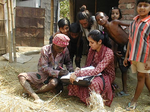 Credit: University of Salford researcher Priya Mondal conducting a major research project that identified millions of people at risk of serious genetic damage from arsenic absorbed by rice in India in 2013 Credit: Flickr