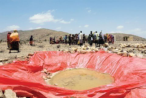 Displaced people gather at an artificial water pan near Habaas town of Awdal
region in Somaliland in April 2016. As East Africa reels from the worst drought in
a century, scientific studies show the impact of drought is more severe because of
climate change (Photo: Photo: Reuters)
