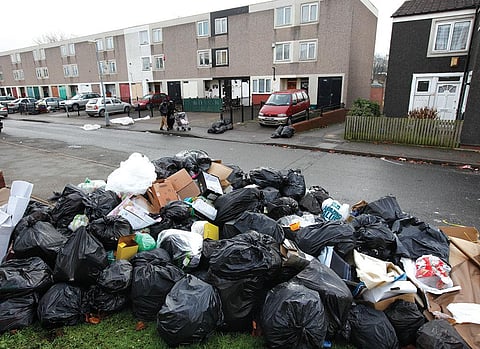 Piles of garbage along the streets became a common sight in the UK after China banned importing plastic waste (Credit: Reuters)