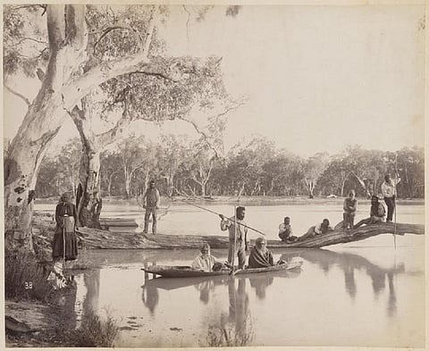 An image from 1886 showing a group of Indigenous Australians posed around the lower Murray River in flood. national_library_of_australia_commons/flickr , CC BY