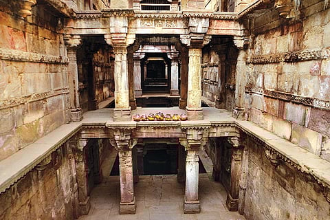 Constructed around 15th-16th century, Ashapura Mata ni vav is known for its wells located some 20 metres below the ground and intricate stone carvings. Today, it is surrounded by a residential colony in Ahmedabad. A temple that uses part of it for storage has insensitively renovated it by using paints, porcelain tiles and Kota stone (Photographs: Dhvanit Raval)