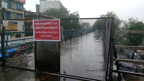 A bridge at Mumbai's Malad station shuts owing to water logging. Credit: David/Twitter