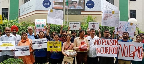 Ten civil society organisations, under the banner of Indian For Safe Food, staged a protest outside the office of FSSAI. Credit: Banjot Kaur