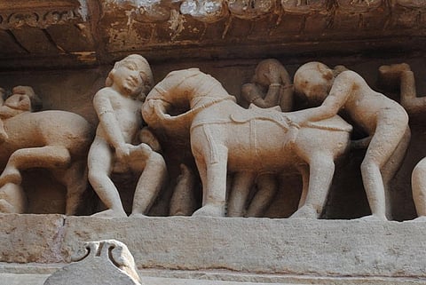A man having intercourse with a horse, pictured on the exterior of a temple in Khajuraho Credit: Wikimedia Commons