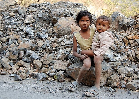 Poverty is one of the major reasons that children don't receive education. Credit: Wikipedia