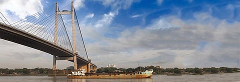 An old rusty ship anchored near the Vidyasagar Setu on the river Hooghly at Kolkata. Credit: Getty Images