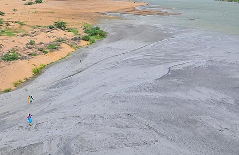 A file photo of fly ash released into the Renuka river by a coal-based thermal power plant at Obra in Sonbhadra district of Uttar Pradesh. Credit: Meeta Ahlawat