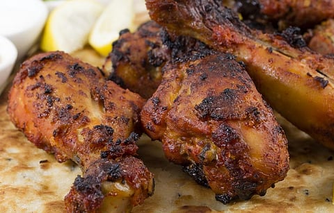 Tandoori chicken and naan bread. Credit: Getty Images