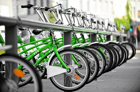 Can bicycle sharing reduce global carbon emissions?