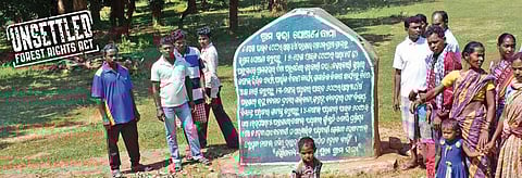 On the stone slab in Odisha's Goelsukha village, people assert their right over minor forest produce, its collection, use and sale under the Forest Rights Act. Photo: Priya Ranjan Sahu