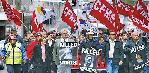 Union members march in Sydney on August 4, 2004 to protest against James Hardie Industries' compensation offer to former employees who have contracted asbestos related illnesses. Photo: Reuters