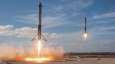 Two side-booster rockets of SpaceX’s Falcon Heavy  touch down on landing pads in Florida on April 11. This is a landmark progress in reusable rocket technology, which will make space flight significantly cheaper (Photo Courtesy: SPACEX)
