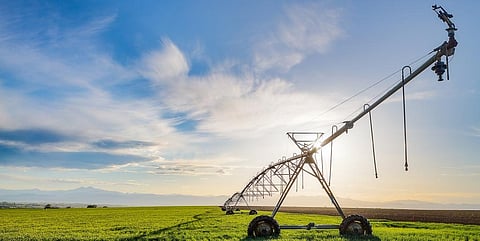 An irrigation sprinkler powered by a solar pump under precision farming. Photo: Getty Images