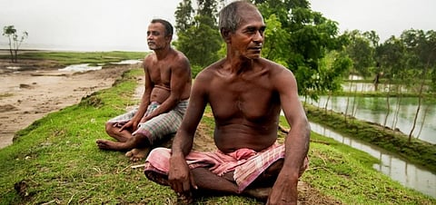 Locals at Ghoramara island in the Sundarbans that is disappearing due to coastal erosion. Photo: Flickr