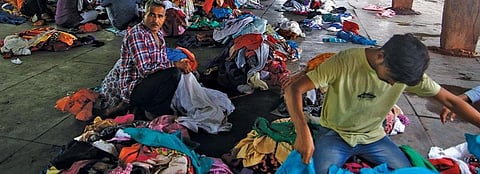 Vendors selling used garments in Delhi's Raghubir Nagar. Photo: Vikas Choudhary