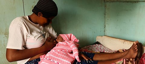 A mother breastfeeds her baby. Photo: Flickr/Dominic Chavez/World Bank