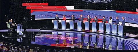 (Left to right) Senator Michael Bennet, Senator Kirsten Gillibrand, Former Housing and Urban Development Secretary Julian Castro, Senator Cory Booker, Former Vice-President Joe Biden, Senator Kamala Harris, Entrepreneur Andrew Yang, US Representative Tulsi Gabbard, Washington Governor Jay Inslee and New York City Mayor Bill de Blasio pose before start of the second US 2020 presidential Democratic candidates debate in Detroit on July 31, 2019. (Photo: Reuters)