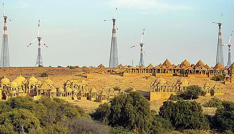 India has pledged to install 60 GW of wind energy capacity  by 2022. Setting up wind-solar hybrid parks may help achieve this (Photograph: Reuters)