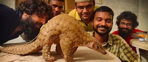 A team of researchers observing the world's first-ever radio-tagged Indian Pangolin. Photo: WCT / MP Forest Department