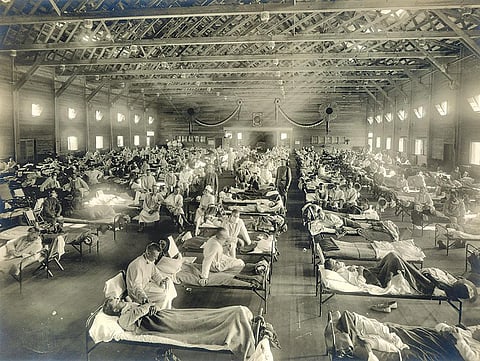 Influenza victims crowd into an emergency hospital near Fort Riley, Kansas, US, in 1918 during the Spanish flu, the first pandemic in recorded history that lasted two years (Photograph: National museum of health and medicine)