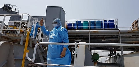Health officials aboard a ship in Paradip port to examine crew members. Photo: Ashis Senapati