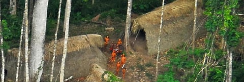 An uncontacted tribe photographed in the Brazilian state of Acre. Photo: Wikimedia Commons