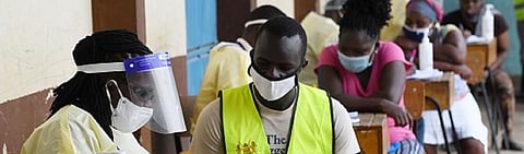 Health care workers testing people in Nairobi, Kenya during a mass testing exercise for COVID-19. Photo by SIMON MAINA/AFP via Getty Images