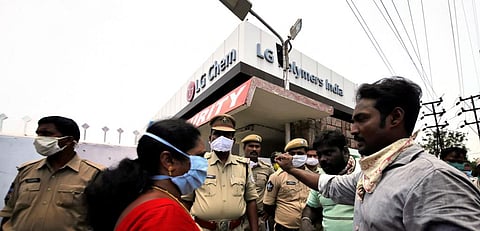 Residents speak with a local politician outside the LG Polymers plant following the gas leak in Visakhapatnam ; Photo: Reuters