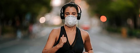 At low to moderate-intensity exercise, effort will feel slightly harder than normal with a mask Photo: Daniel Carpio/Shutterstock