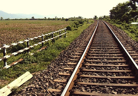 A railway track cuts through Guwahati’s Deepor beel, one of the most encroached water bodies in Assam. Photo: Mudit Mishra