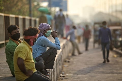 काम का इंतजार करते मजदूर। फोटो: विकास चौधरी