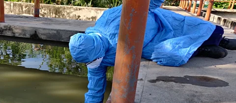 Collection of sewage sample from a treatment plant in Hyderabad.