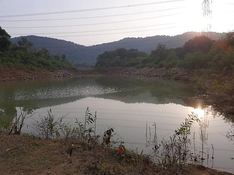 A farm pond dug up by the villagers of Hatiganj under Kantapada panchayat under the watershed project. Several acres of farmland surrounding the pond make a good harvest every year due to enhanced soil moisture and irrigation facility. Photo: Ashok Satpathy
