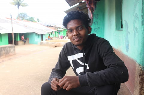 Nabin Saunta in front of his house at Kanjariguda village in Lakhimpur block under Koraput district. Photo: Abhijit Mohanty