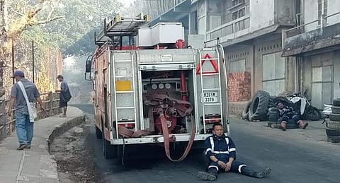Exhausted firefighters pause for a rest in Lunglei town, Mizoram. Photo: Twitter Handle of Mizoram CM, Zoramthanga