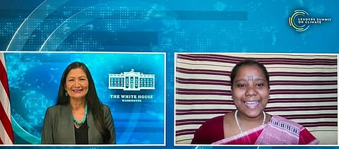 Aracha Soreng talking to US lawmaker Deb Haaland during the US Climate Summit