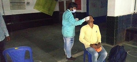 A person being tested for COVID-19 at the Khariar Road Railway Station in Odisha's Nuapada district. Photo: Twitter Handle of the Collector and District Magistrate of Nuapada