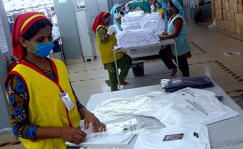 Women garment industry workers in Bangladesh. Photo: Fahad Faisal via Wikipedia