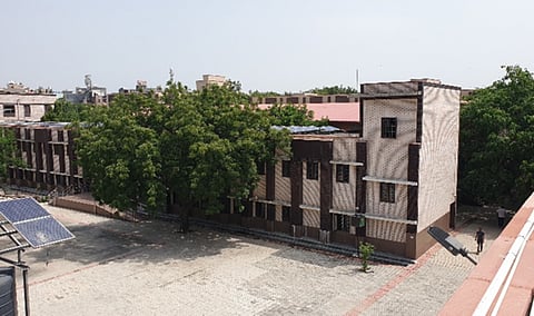 At a school in West Vinod Nagar, Delhi. The Delhi government in 2020 established rooftop solar projects atop 150 school buildings under a central government scheme. Photo: Sumedha Awasthy and Binit Das