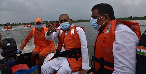 Bihar CM Nitish Kumar surveys flood-affected areas of Darbhanga and Madhubani on August 31. Photo: @WRD_Bihar / Twitter