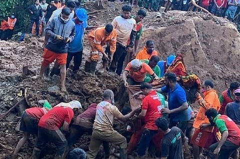 Rescue efforts after a landslide. Photo: @oma_salam / Twitter