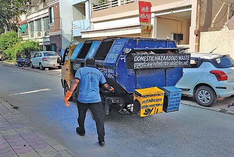 Garbage collection trucks in Indore have six compartments to carry wet, dry, hazardous, plastic, sanitary and e-waste (Photograph: Richa Singh)