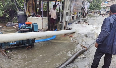 Water being pumped out from a flooded Chennai street. Photo: @chennaicorp / Twitter