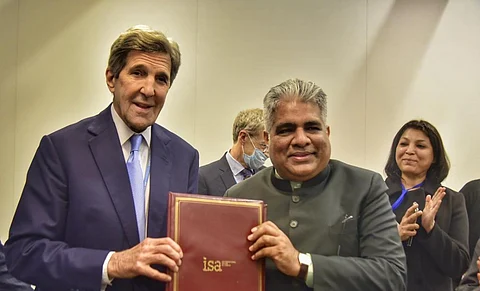 US Special Presidential Envoy for Climate John Kerry along with Union Environment Minister Bhupender Yadav. The United States has joined the International Solar Alliance as a member country announced at the UNFCCC CoP26. Photo: @isolaralliance / Twitter